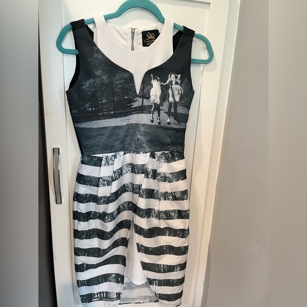 PLAINS and Prints jumping girls sleeveless tulip hem dress. Size 4 .